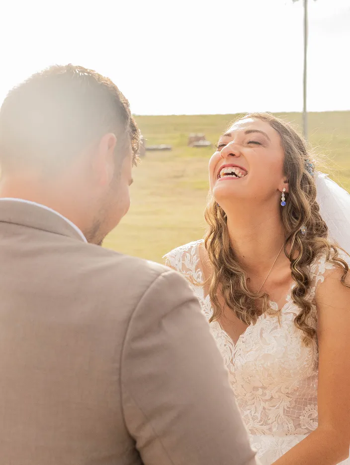 Wedding Couple laughing with each other