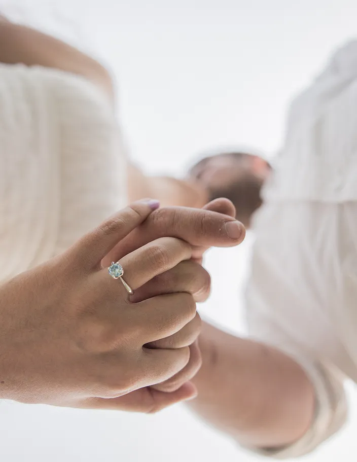 Looking up at Engagement of couple