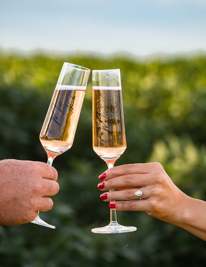 Engagement celebrating with wine