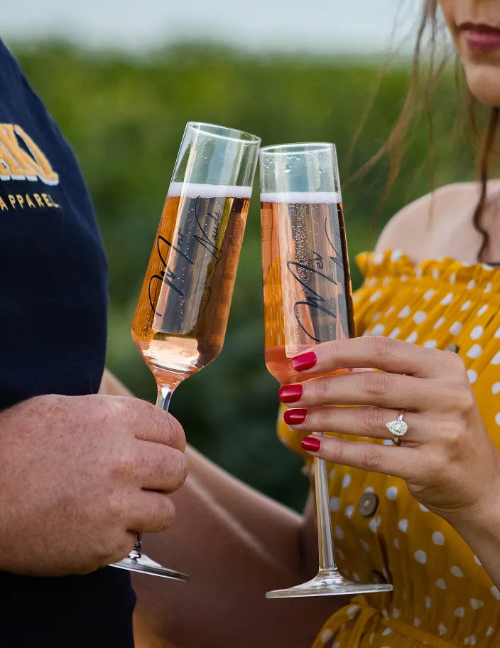 Engagement celebrating with wine