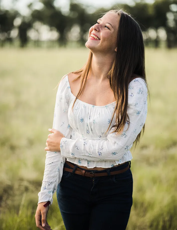 Individual girl facing the sun